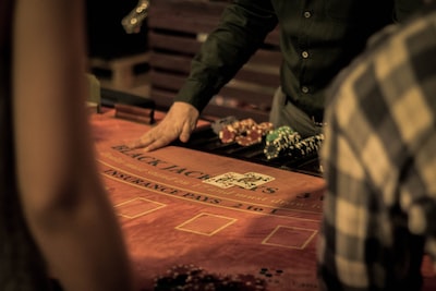 An image depicting a serene setting with a laptop displaying a responsible gambling website, surrounded by symbols representing safety and regulation, showcasing Hong Kong's commitment to responsible online gambling practices